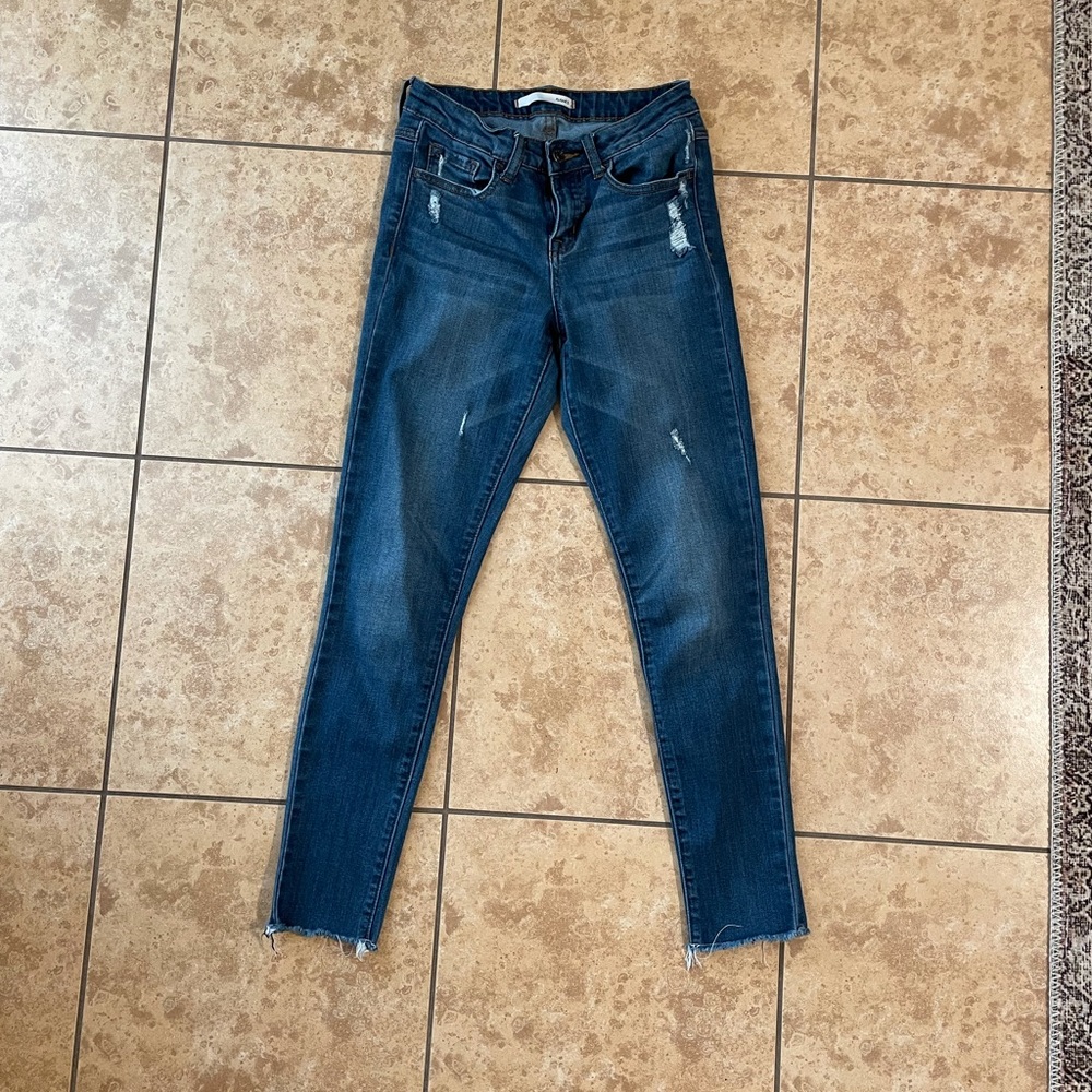 Mid Rise Distressed Skinny Jeans